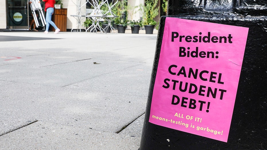 Sign calling for student debt elimination from Biden