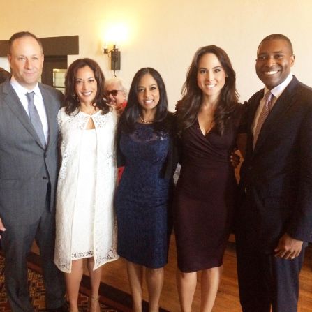 Harris is flanked by her husband, Douglas Emhoff, and her sister, Maya. Next to Maya Harris is Maya's daughter, Meena, and Maya's husband, Tony West.