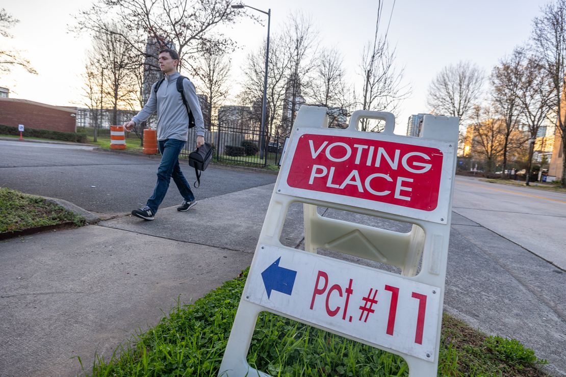 Voters arrive at a polling location in Charlotte, North Carolina, on March 5, 2024.